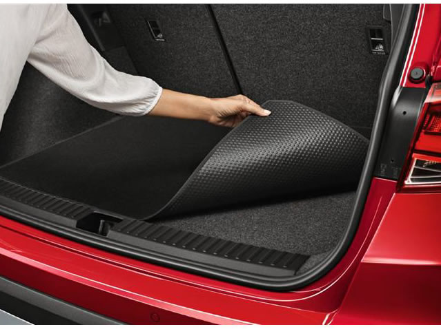 Reversible luggage compartment mat